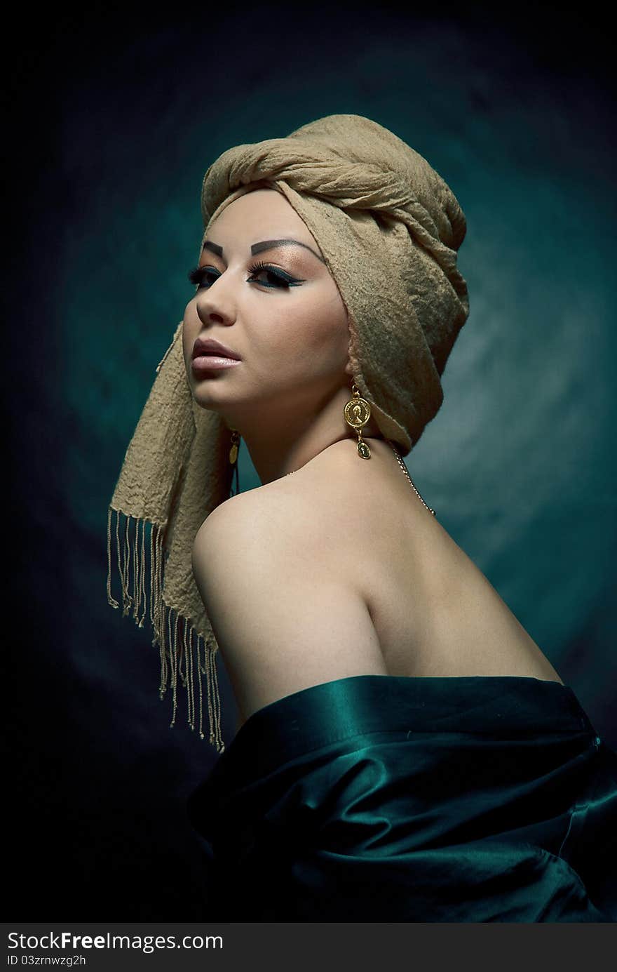 Portrait of a beautiful arabic girl in studio