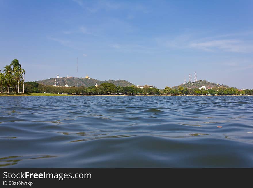 Temple on a hill looking over water in the Province of Thailand. Temple on a hill looking over water in the Province of Thailand.