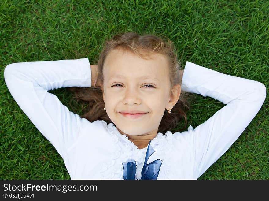 Girl Lying On The Lawn