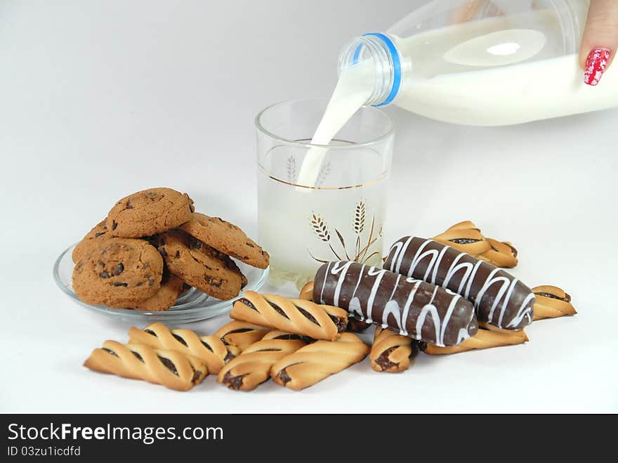 Cookies and milk home, helpful, tasty, natural food with vitamins. Cookies and milk home, helpful, tasty, natural food with vitamins