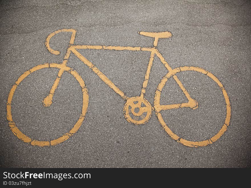 Sign a bicycle path on the pavement