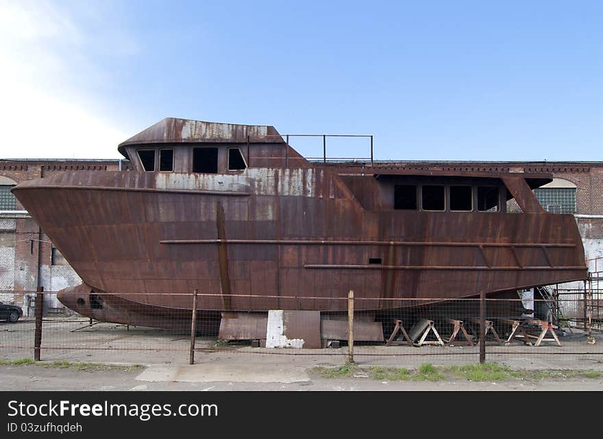 Unfinished old ship at the shipyard in Gdansk. Unfinished old ship at the shipyard in Gdansk.