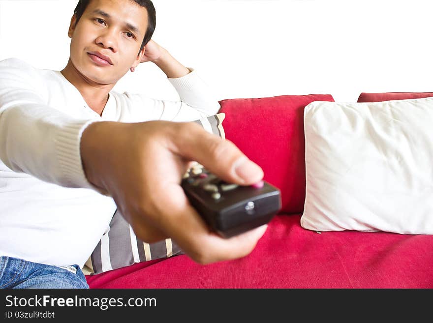 Man pressing remote