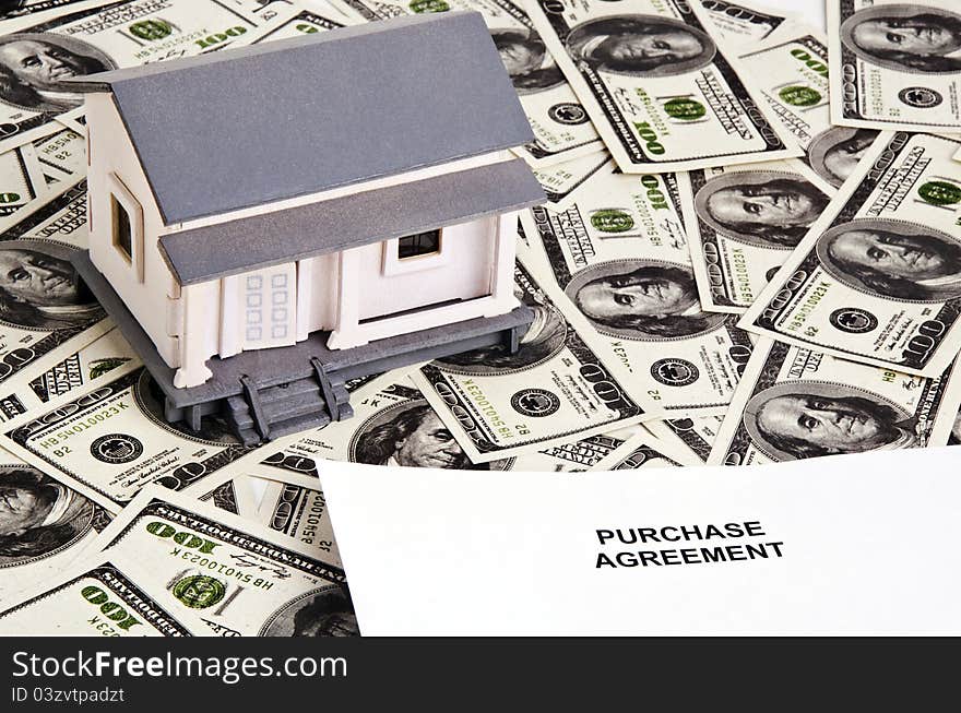 A purchase agreement paper for buying a house. A purchase agreement paper for buying a house