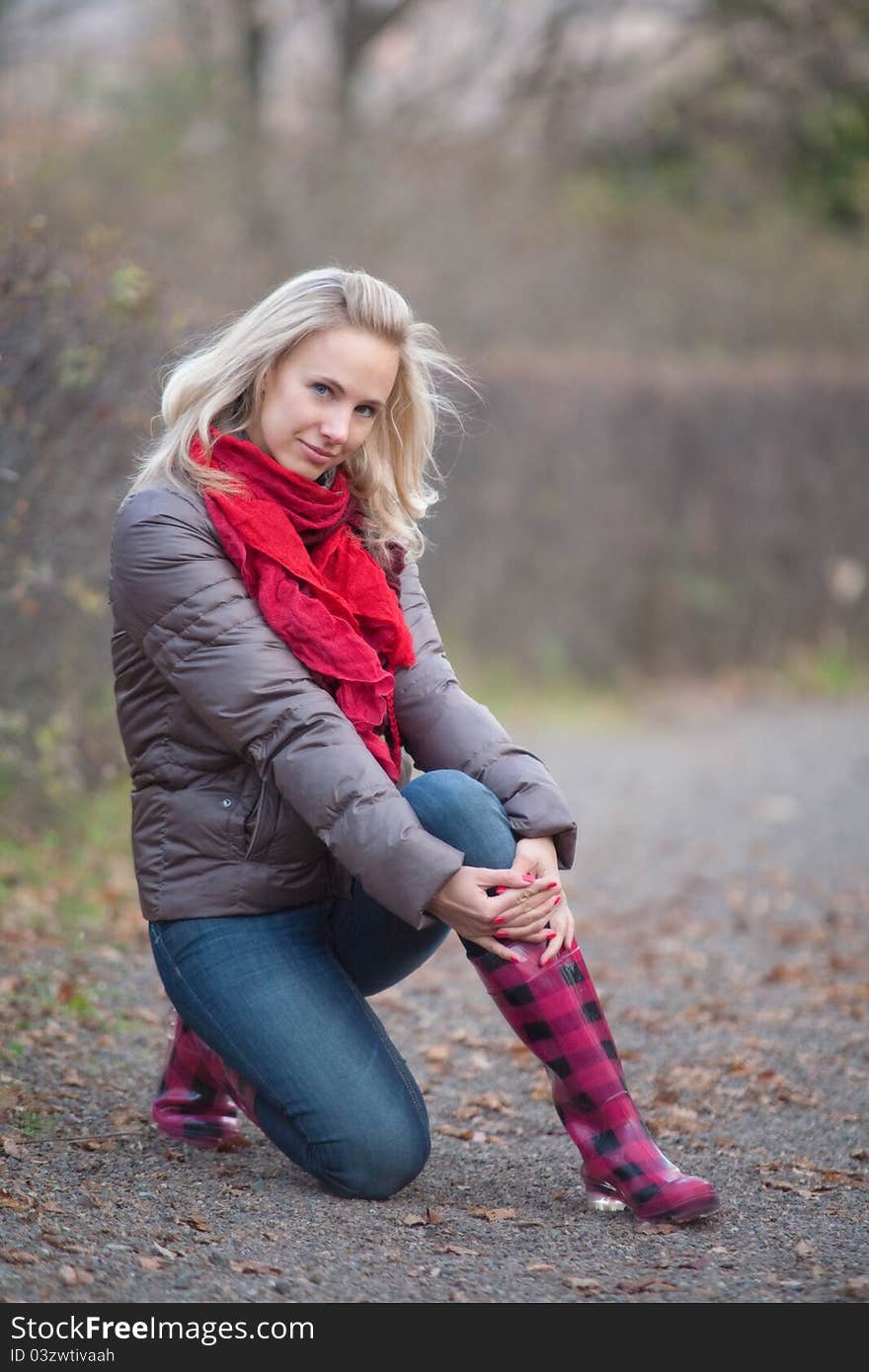 The girl on a walk in the autumn park