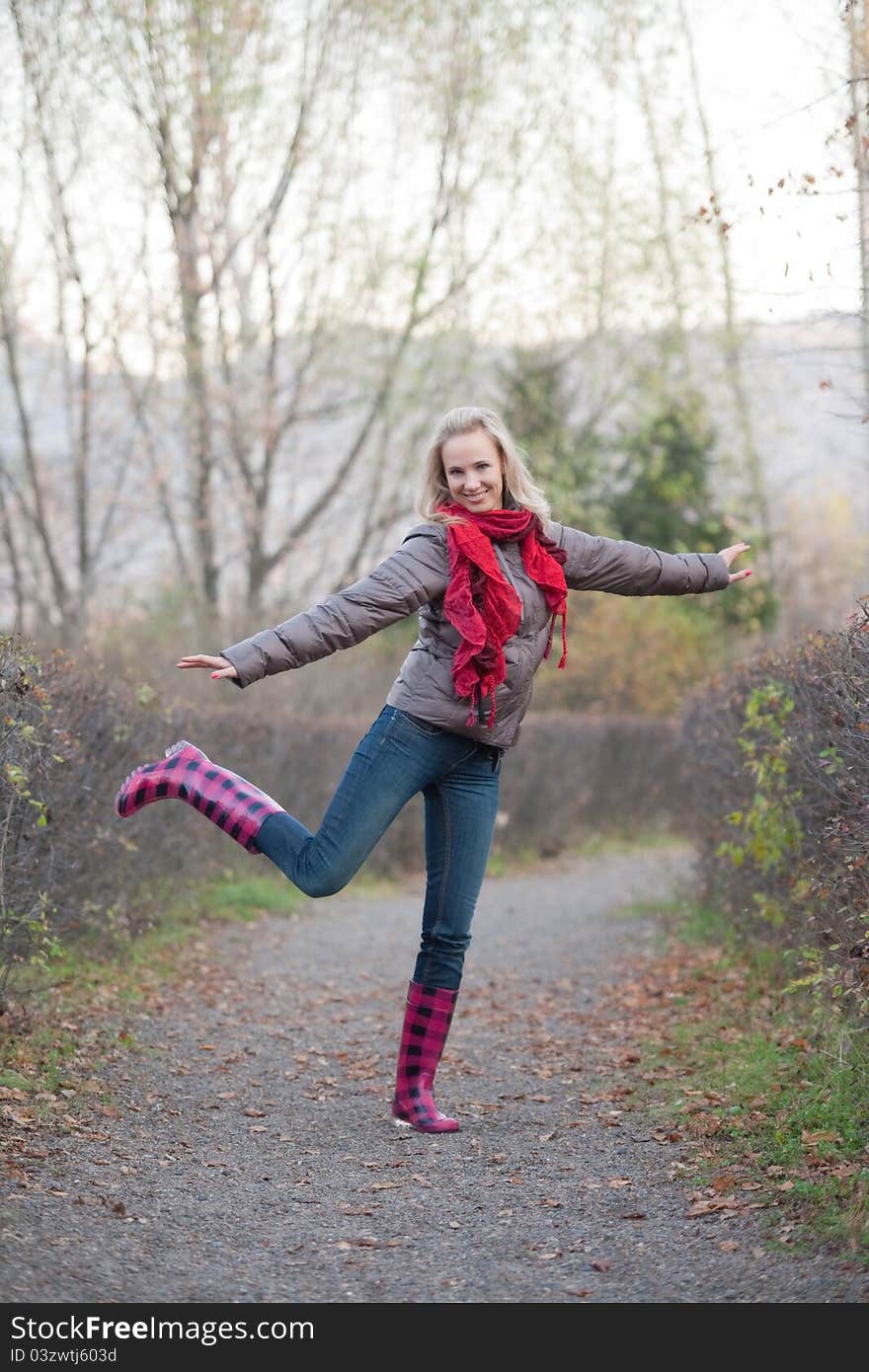 Girl on a walk in the autumn park