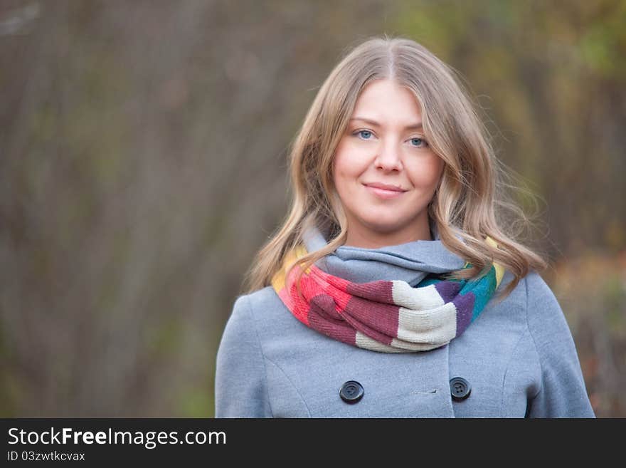 Girl on a walk in the autumn park