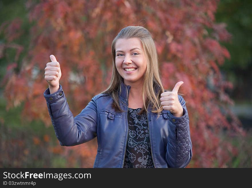 Pretty Positive Girl With Thumbs Up