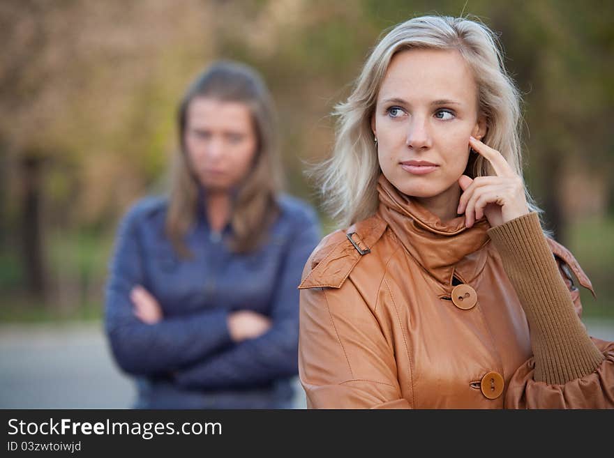 Girlfriend for a walk in the autumn park