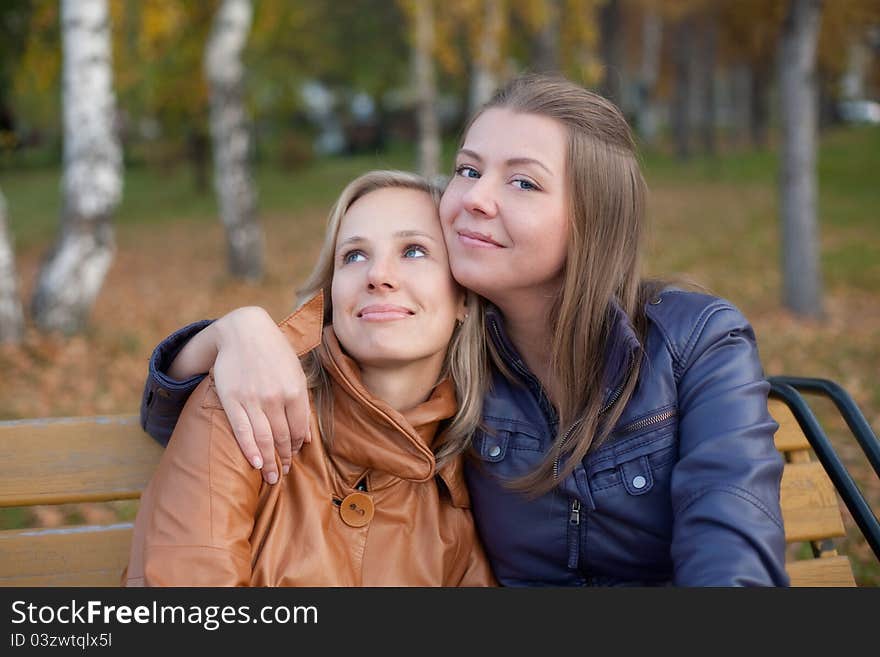 Girlfriend for a walk in the autumn park. Girlfriend for a walk in the autumn park