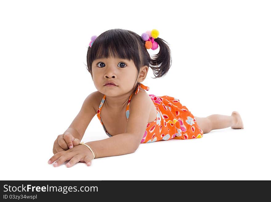 Cute asian girl laying on the floor