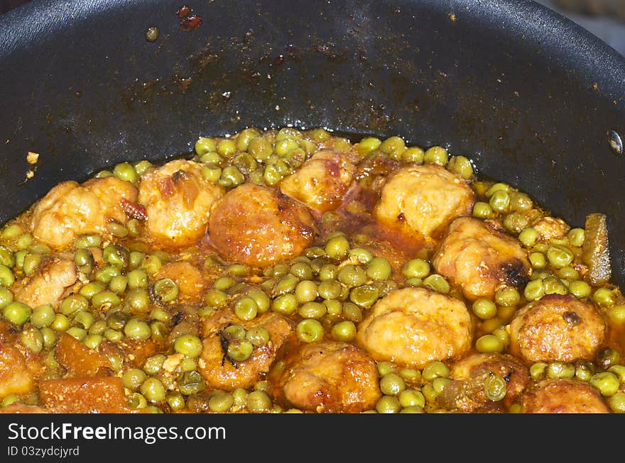 Some meat balls in a dish