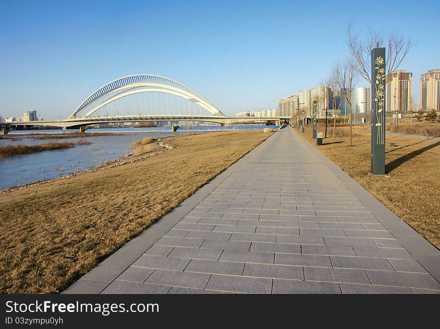 The Fen River Park and Nanzhonghuan Bridge in Taiyuan, Shanxi, China. The Fen River Park and Nanzhonghuan Bridge in Taiyuan, Shanxi, China.