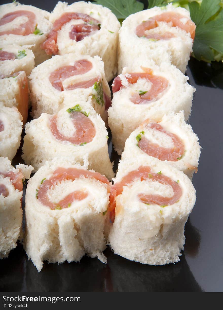 Smoked Salmon Rolls On White Background