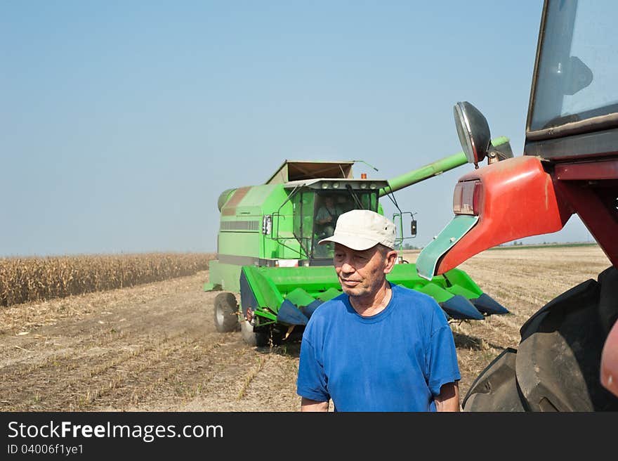 Senior farmer in time harvest