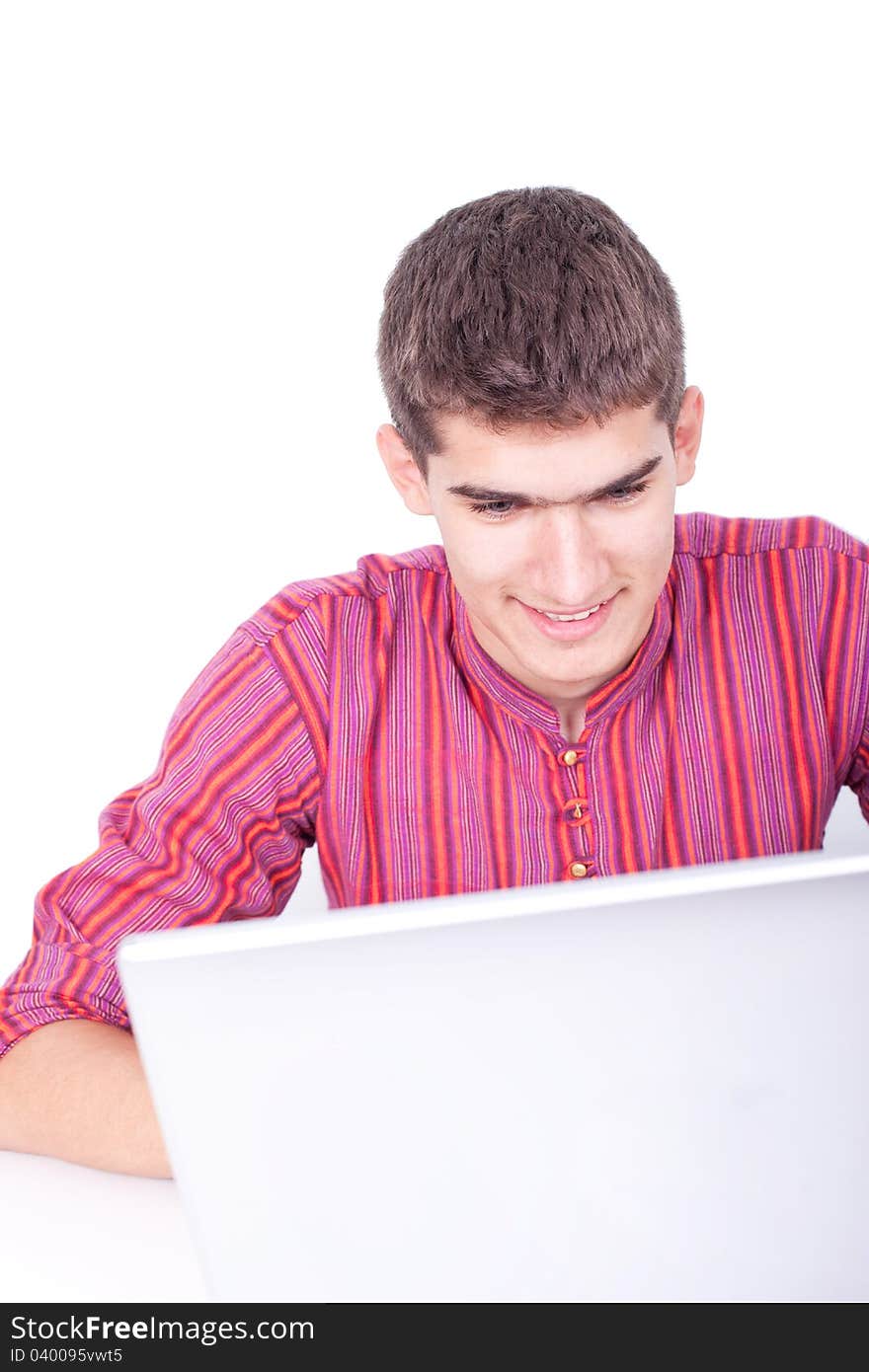 Smart guy with a laptop isolated on white