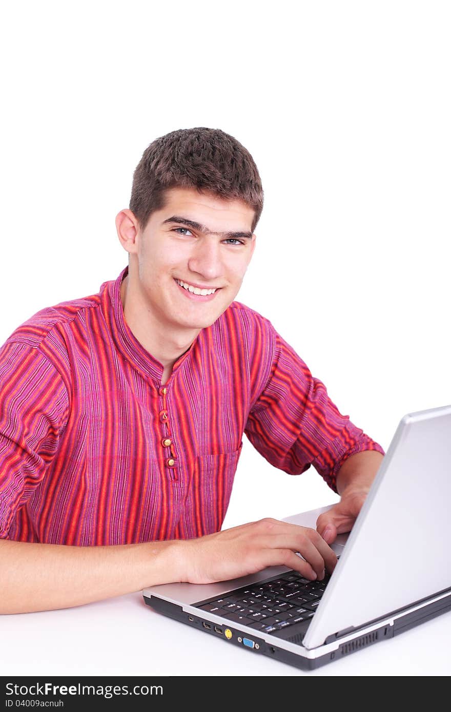 Smart guy with a laptop isolated on white