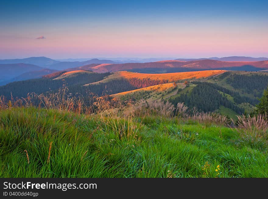 Landscape in the mountains with sunset. Ukraine, the Carpathian mountains. Landscape in the mountains with sunset. Ukraine, the Carpathian mountains