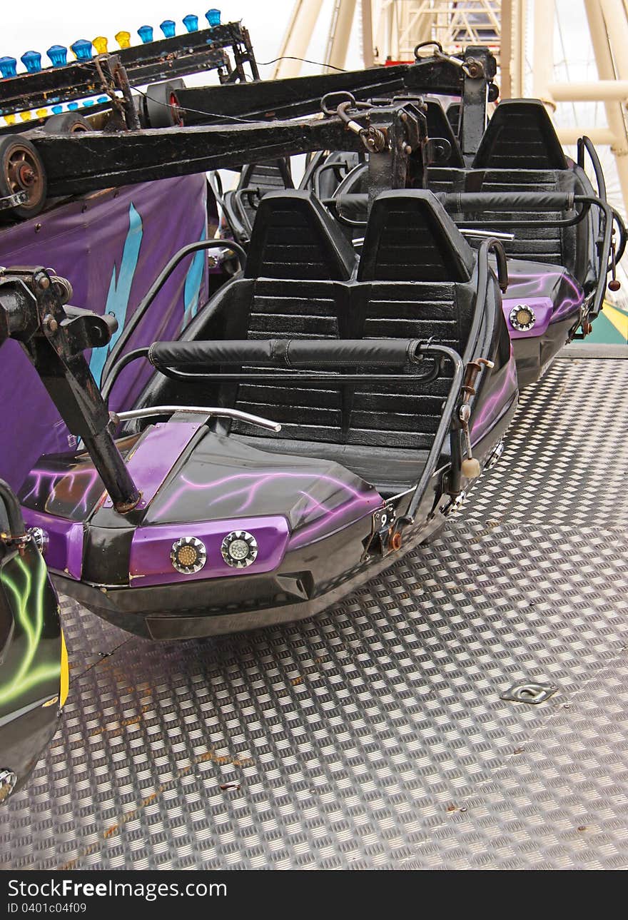 The Carriages and Seats on an Exciting Fun Fair Ride.