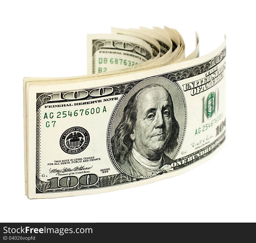 Stack of one hundred dollar bills U.S. on white background