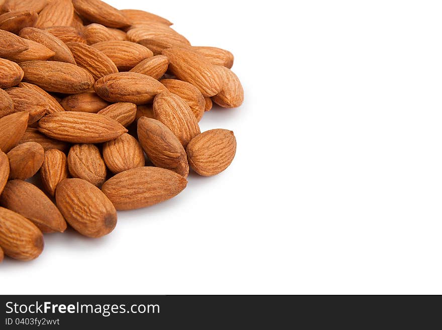 Pile of almonds over white background