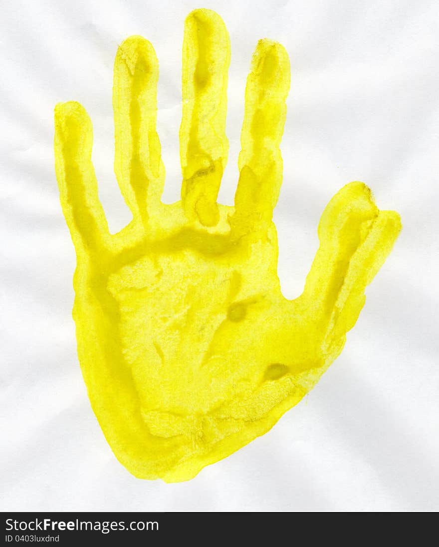 Handprint on a white sheet of paper. Handprint on a white sheet of paper