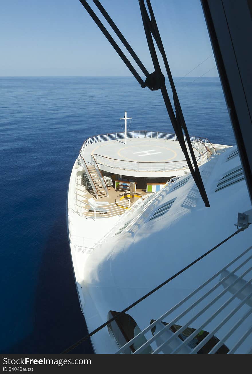 A frontview from the bridge on a cruiseship with a landing platform. A frontview from the bridge on a cruiseship with a landing platform