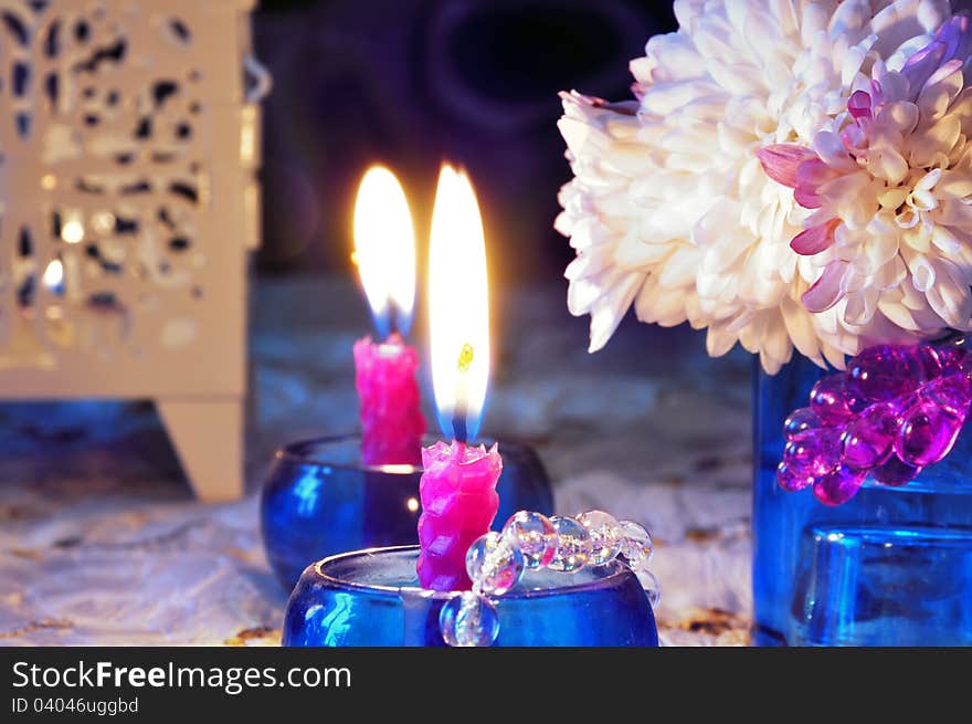 Still life with candles and flower