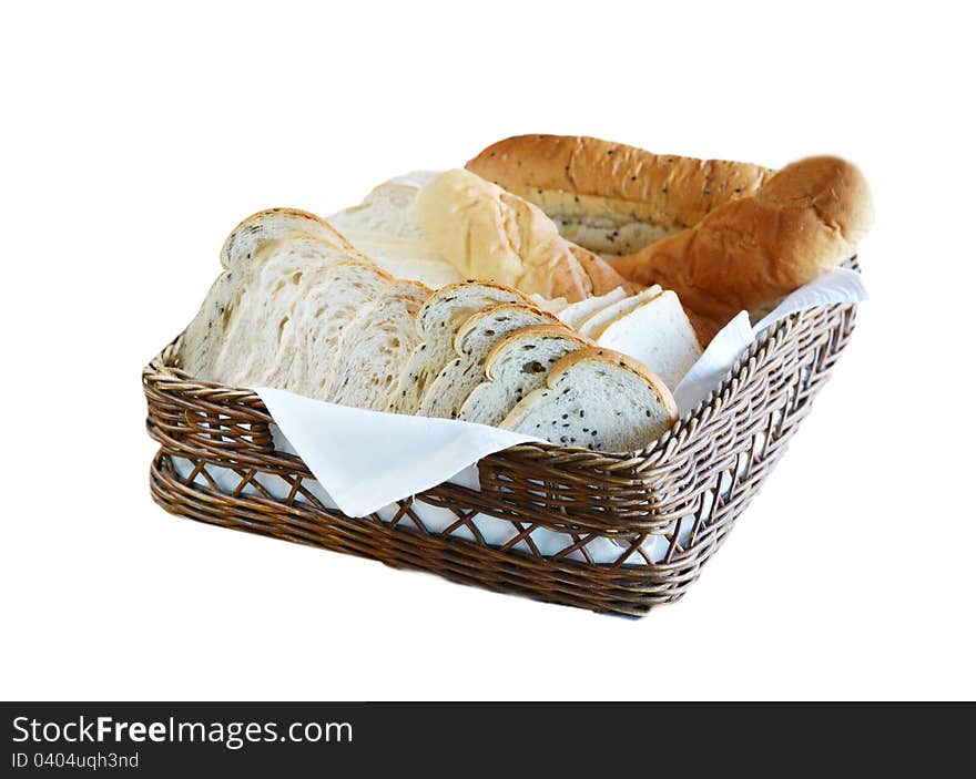 Arrangement of bread in basket on table. Arrangement of bread in basket on table