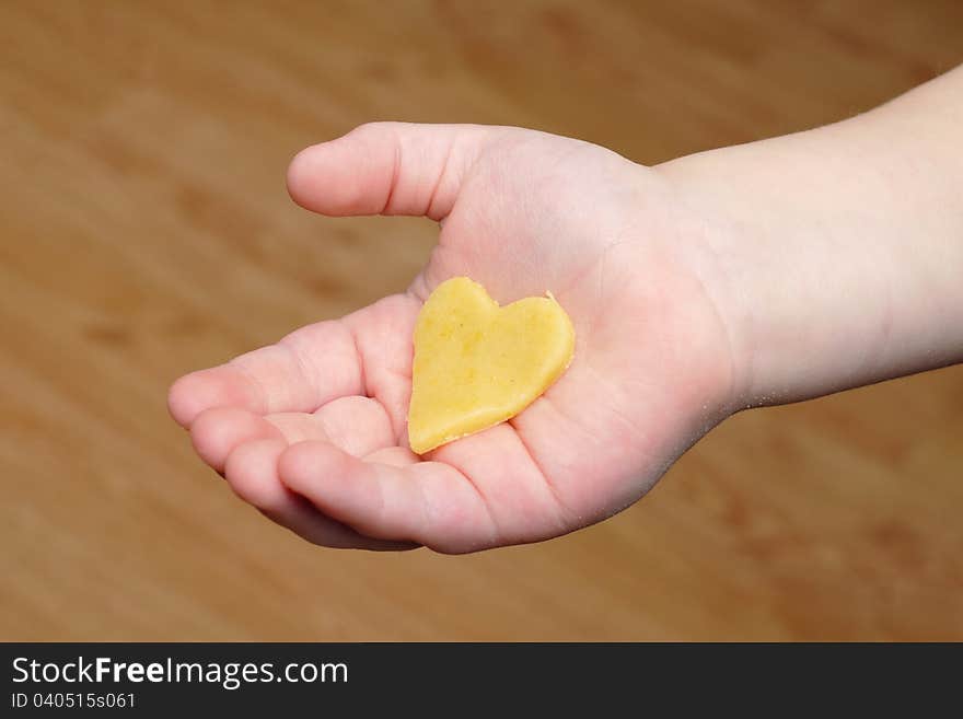 Heart cut out of the dough