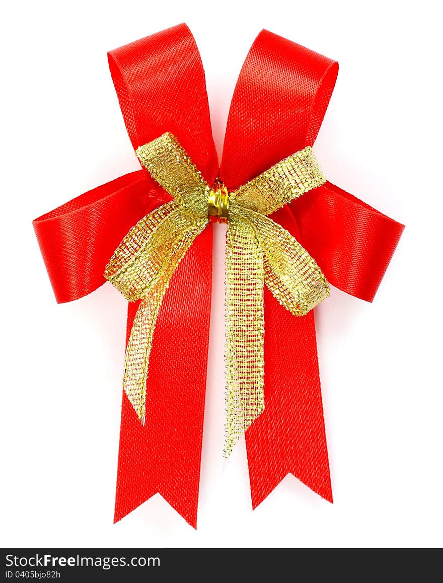 Bright red bow over white background