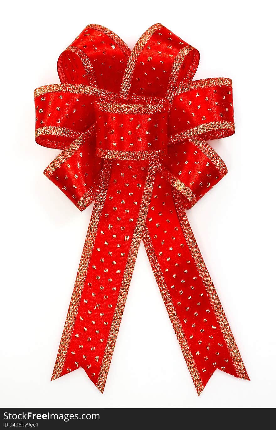 Red bow over white background