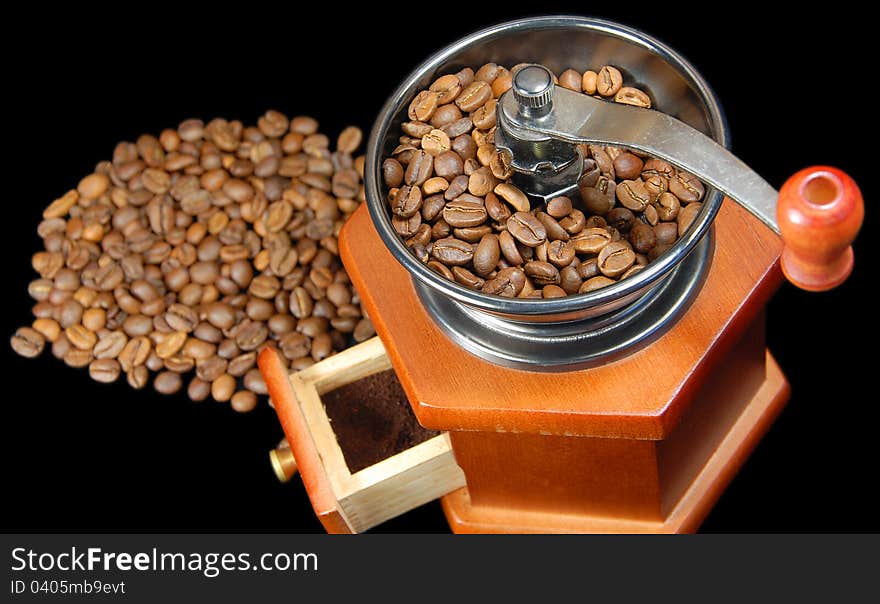 A coffee wooden  grinder black