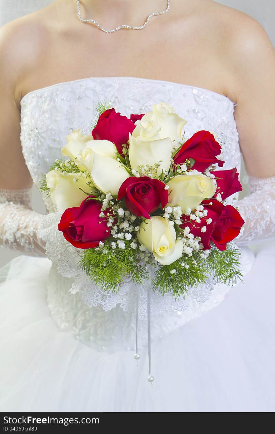 Bouquet of flowers in his hands the bride. Bouquet of flowers in his hands the bride