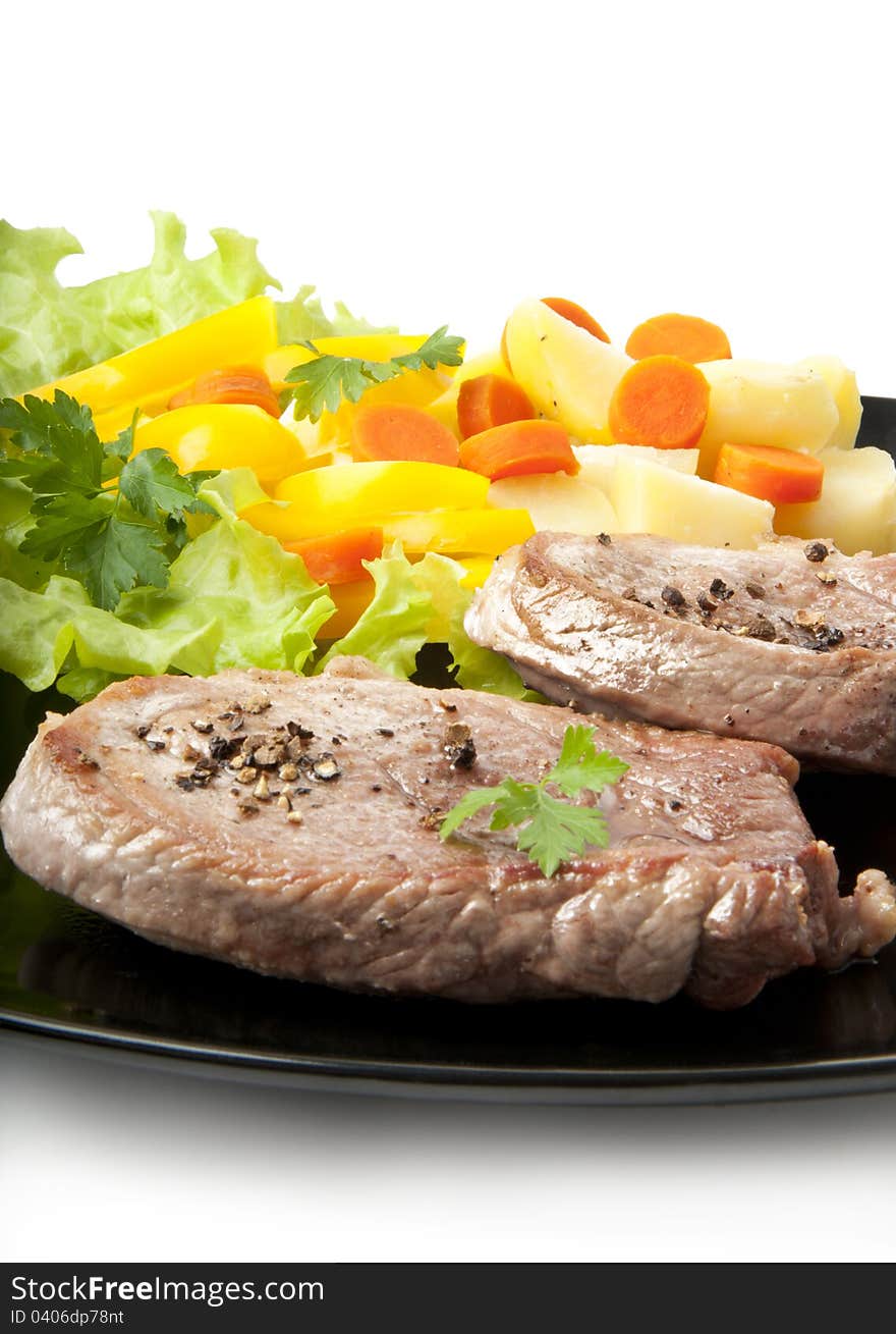 Grilled steak is delicious with vegetables. Grilled steak is delicious with vegetables