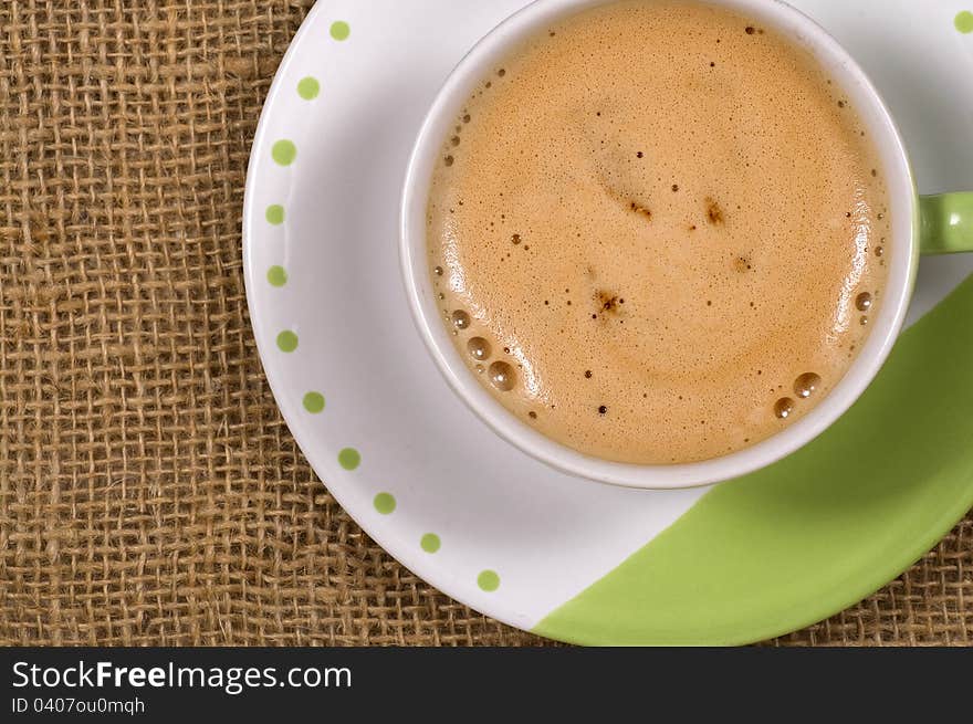 A Cup Of Coffee shot with burlap background