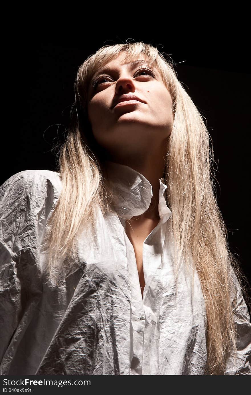 Portrait of girl on a dark background