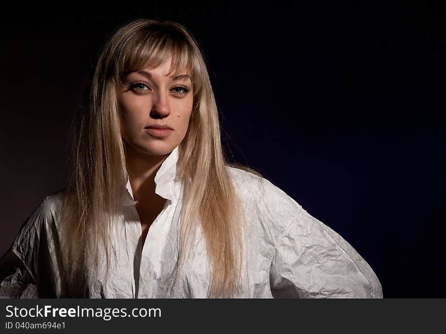 Portrait of girl on a dark background