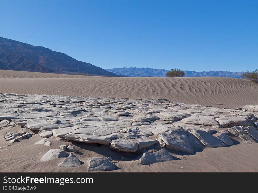 This image captures the intricate patterns of the Mesquite sand dunes in Death Valley National Park. This image captures the intricate patterns of the Mesquite sand dunes in Death Valley National Park.