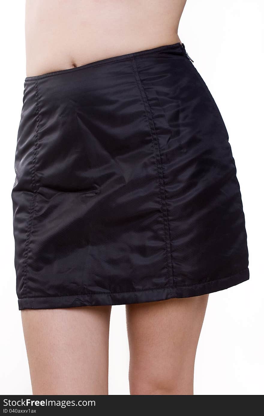 Isolated details of black mini skirt