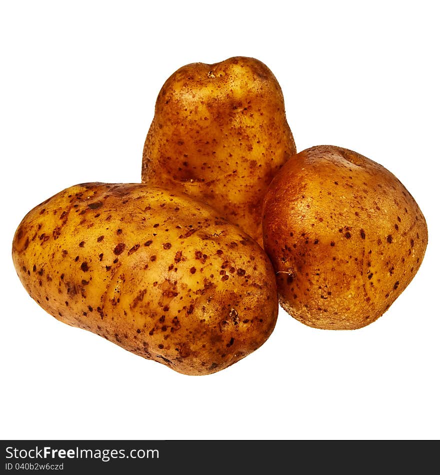 Three fresh, raw potatoes.