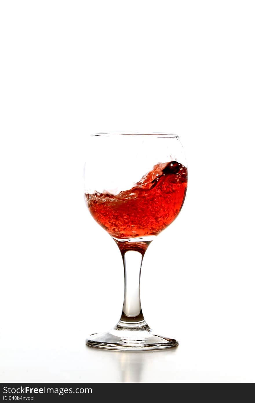 Rose wine in glass isolated on white background. Rose wine in glass isolated on white background