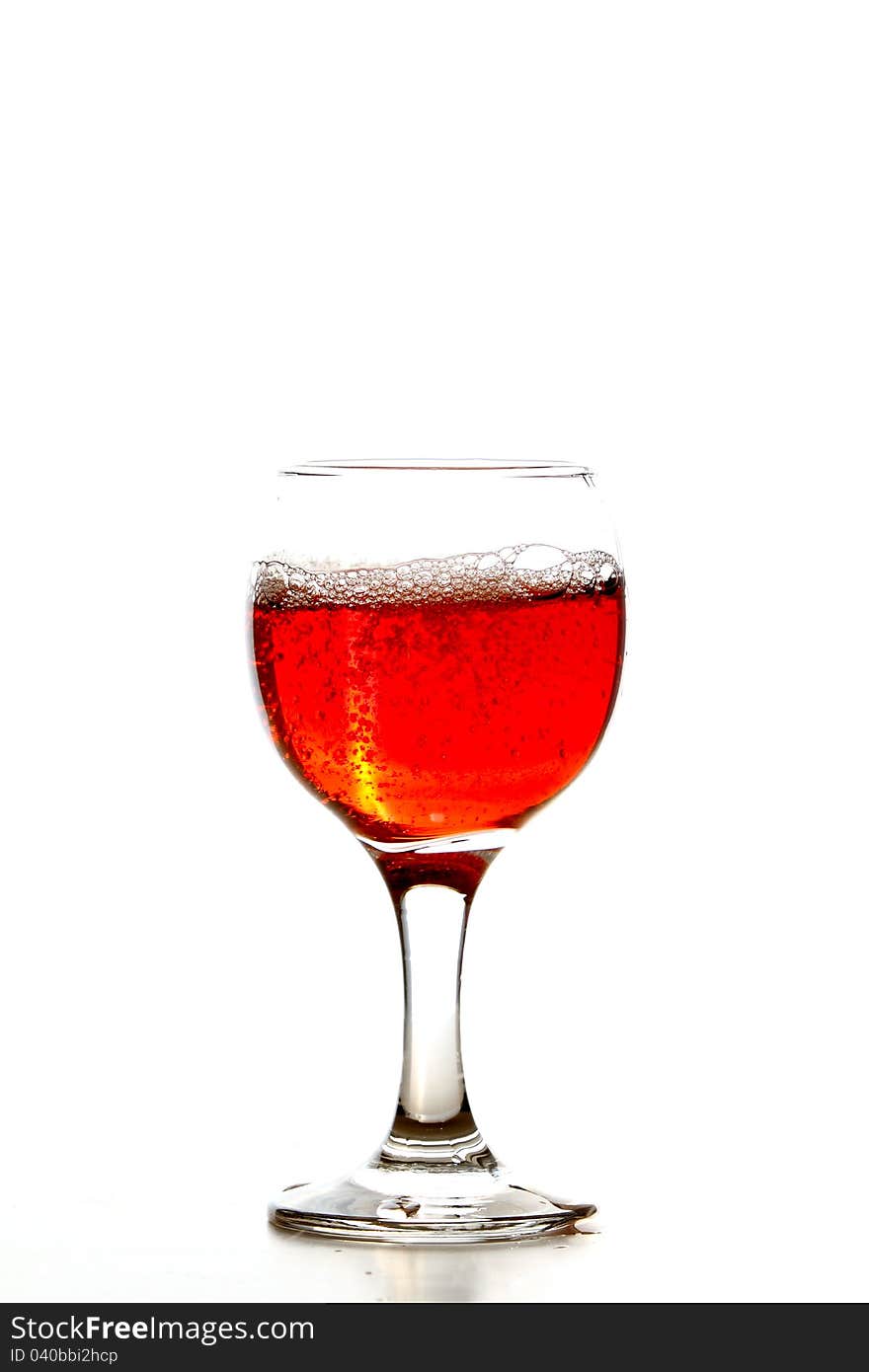 Rose wine in glass isolated on white background. Rose wine in glass isolated on white background