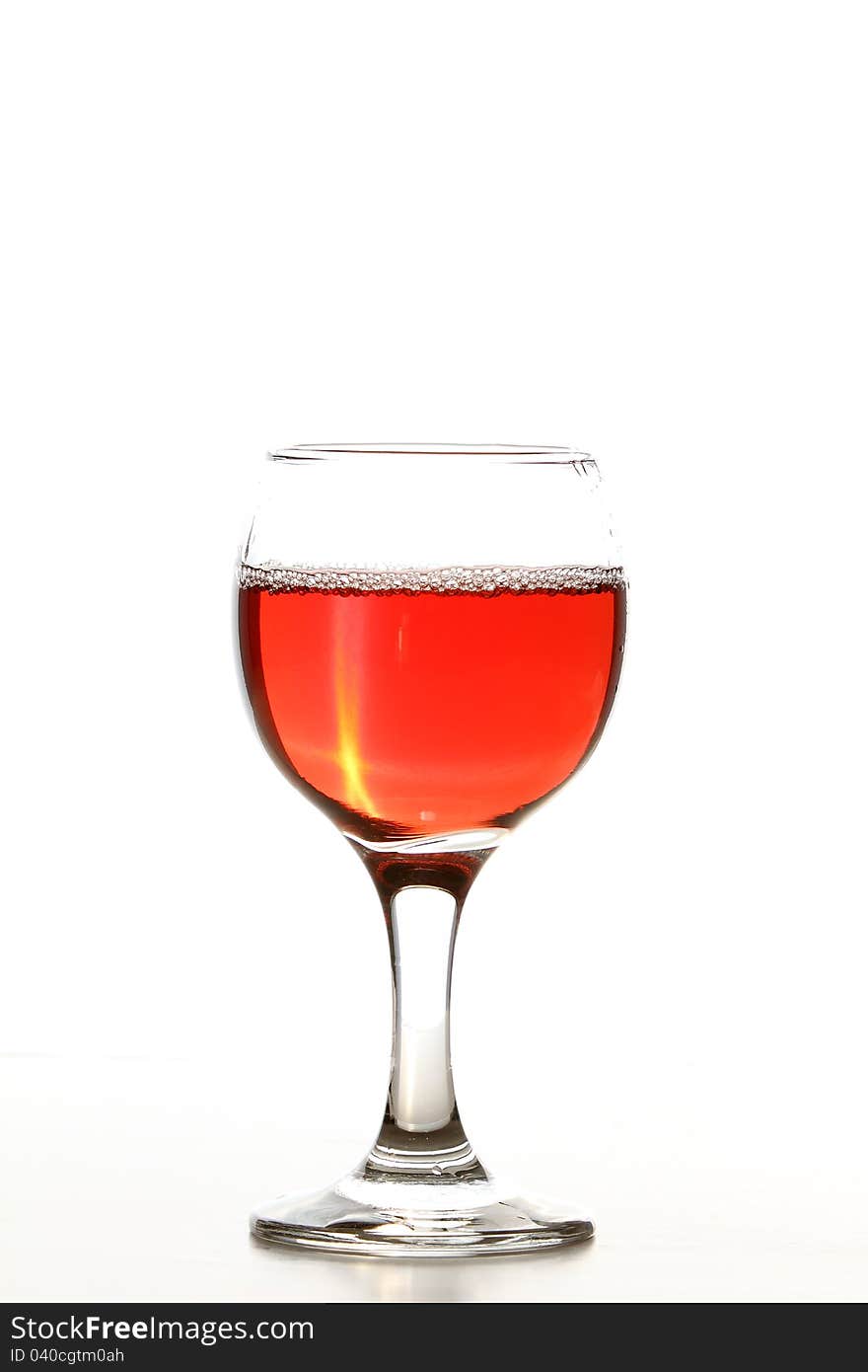 Rose wine in glass isolated on white background. Rose wine in glass isolated on white background