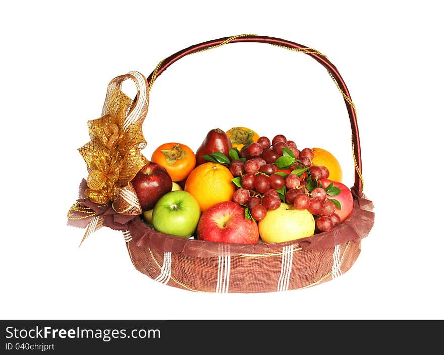 Fruits in basket isolated on white background