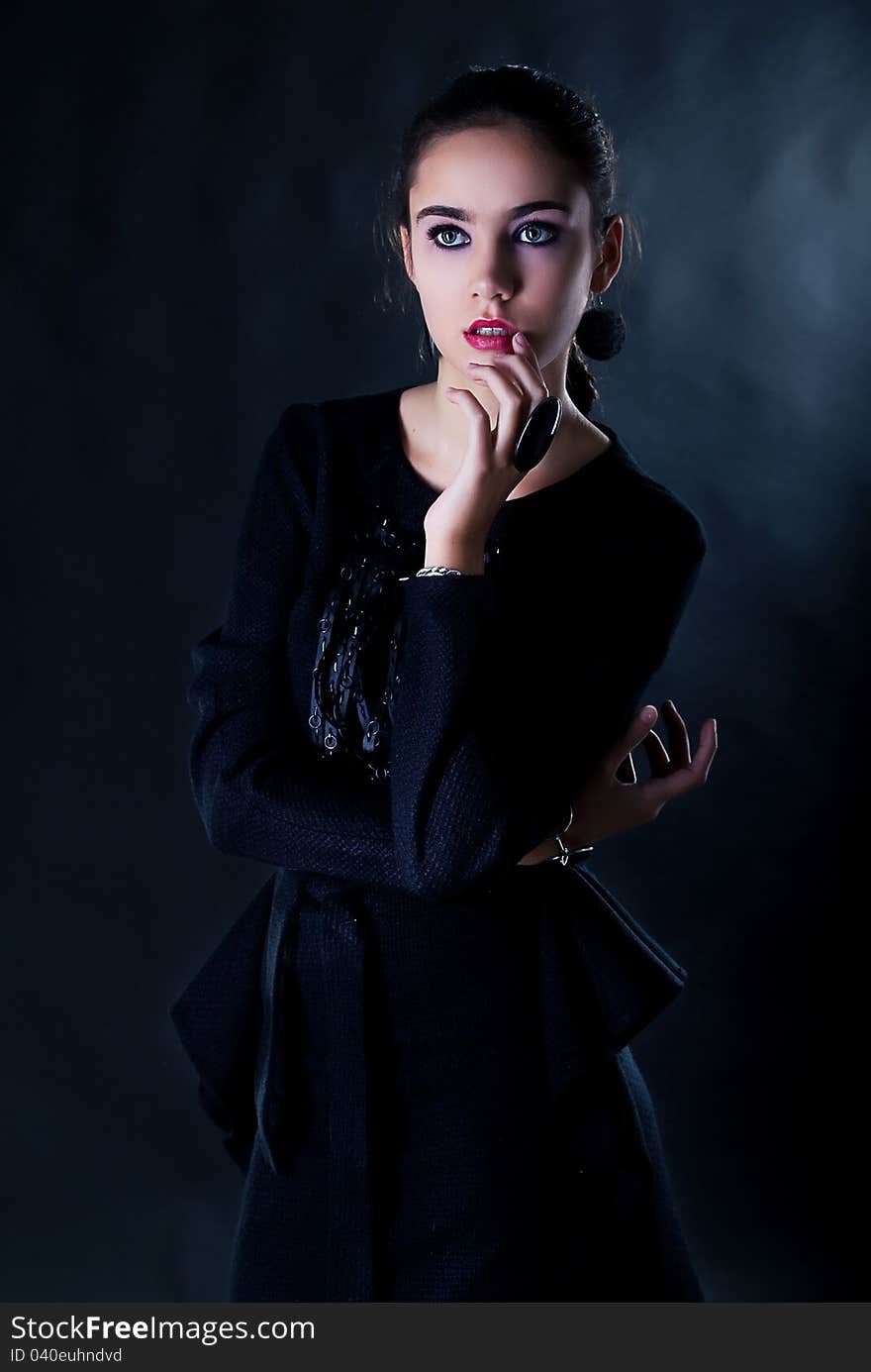 Portrait of nice thoughtful teen girl studio shot