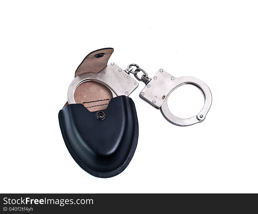 Manacles in leather case of the black colour on white background