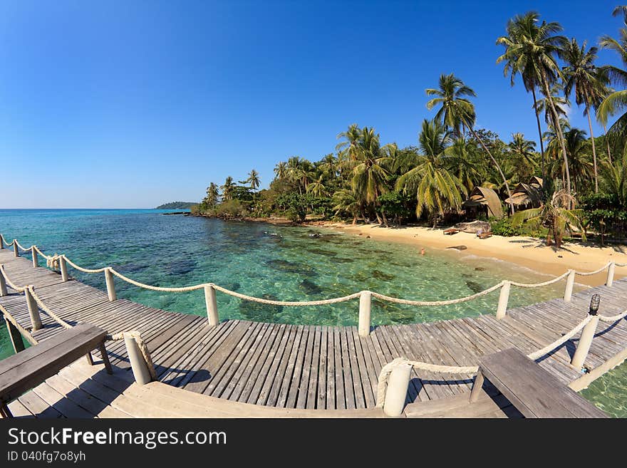 Bridge Lead To Tropical Beach