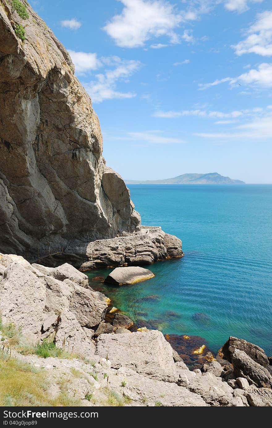 Grotto of Shalyapin is a famous place of the Crimean coast. It is situated in a cliff Orel. The footpath goes along the foot of the mountain. Grotto of Shalyapin is a famous place of the Crimean coast. It is situated in a cliff Orel. The footpath goes along the foot of the mountain.