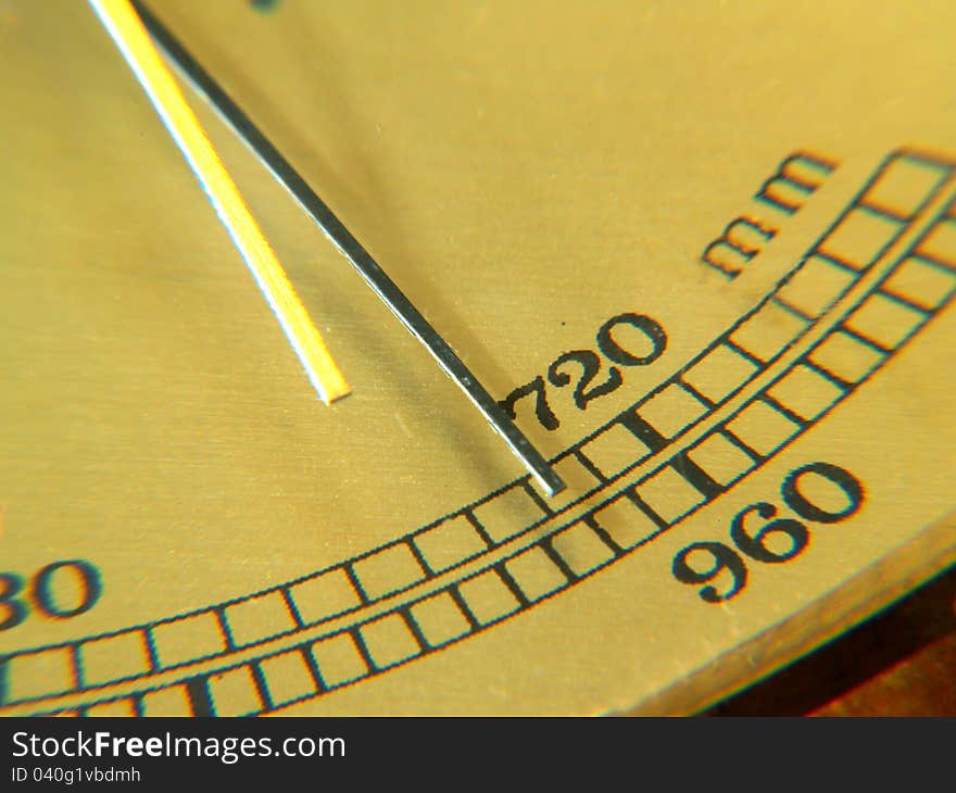 Barometer. Pointer on 720 mm. Yellow panel background.